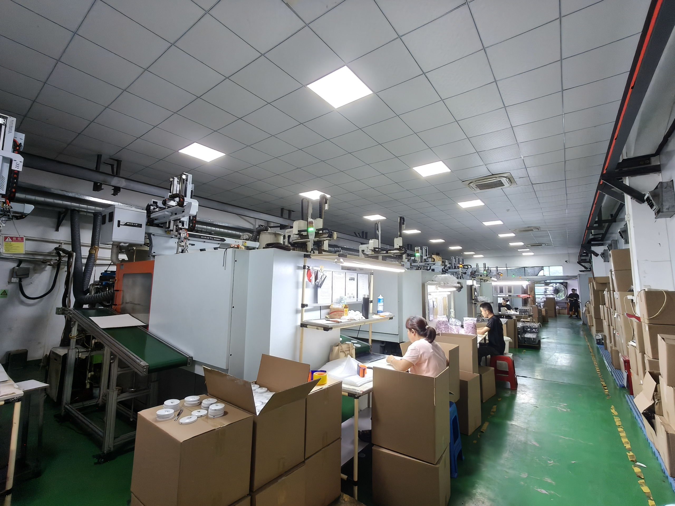 Automated injection molding machines running on production line